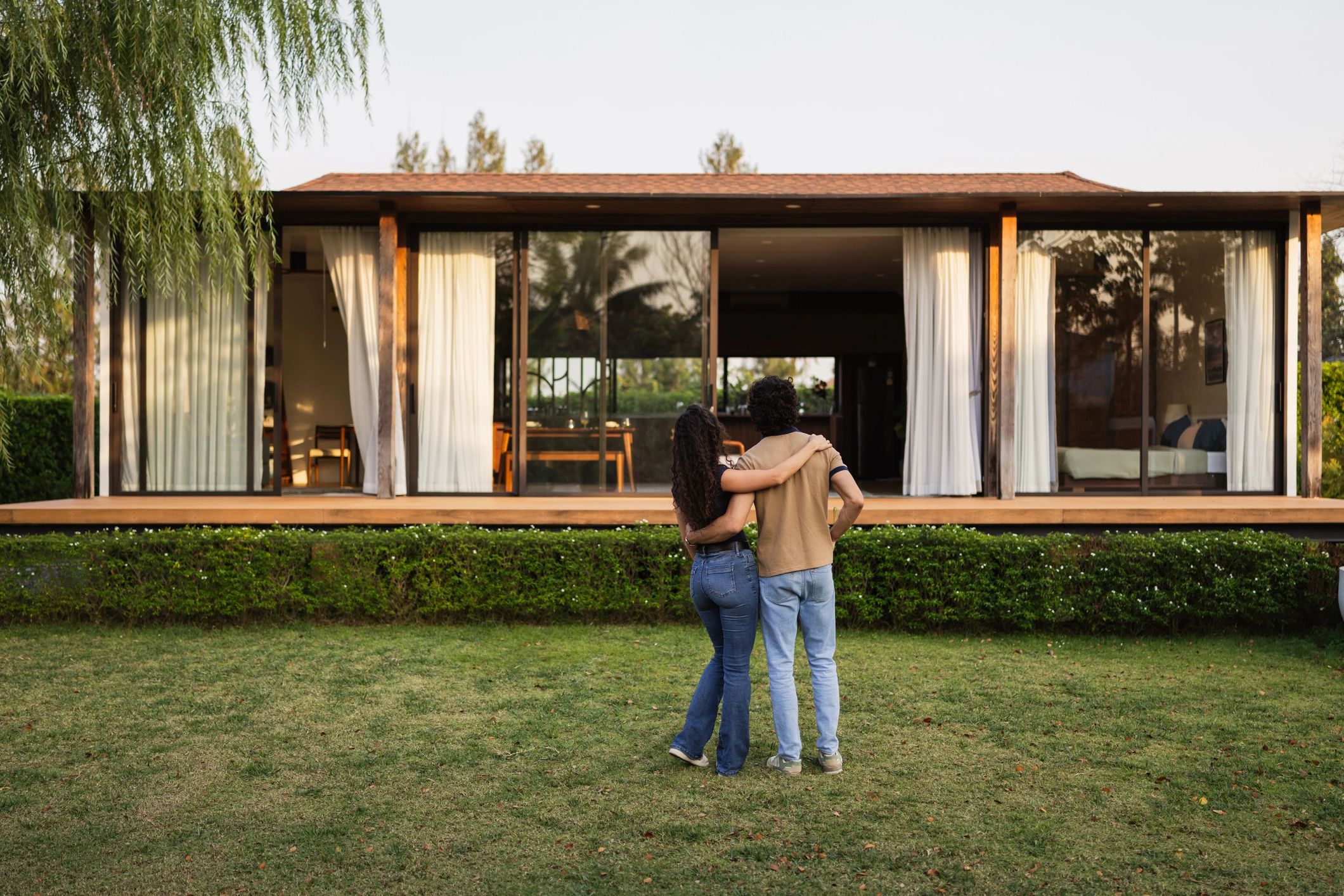 Couple admiring their new modern home together